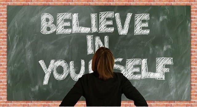 Limiting beliefs Believe in yourself written on a chalkboard