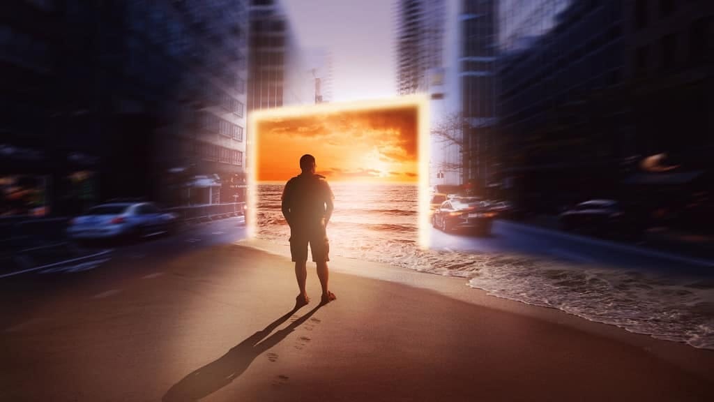 Man walking towards a glowing doorway