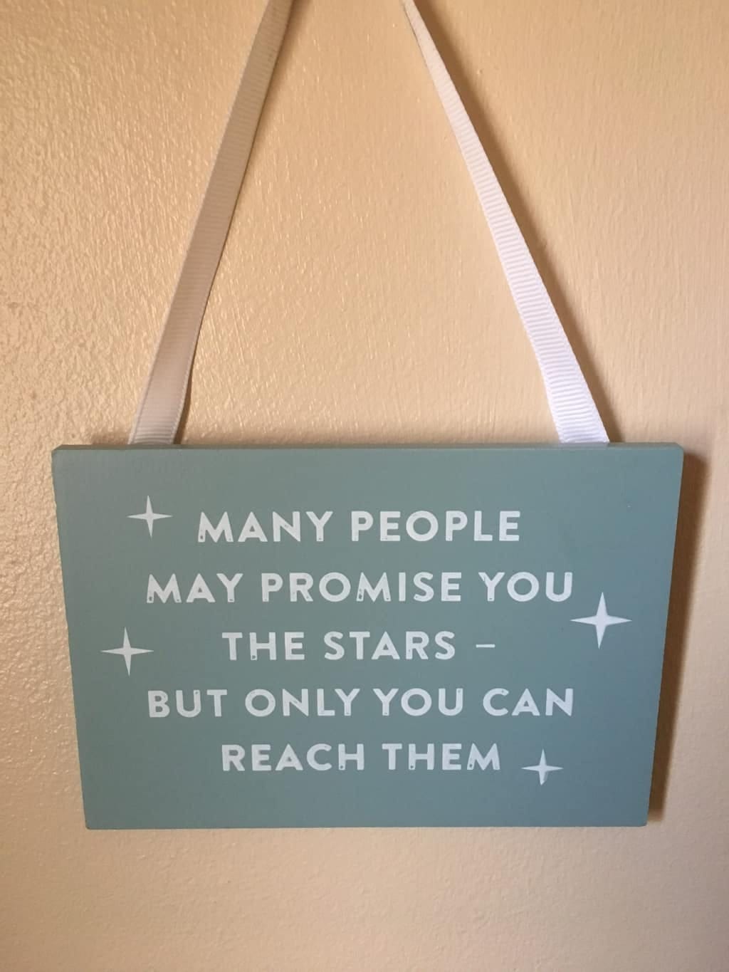 Unlock your potential Sign saying only you can reach the stars